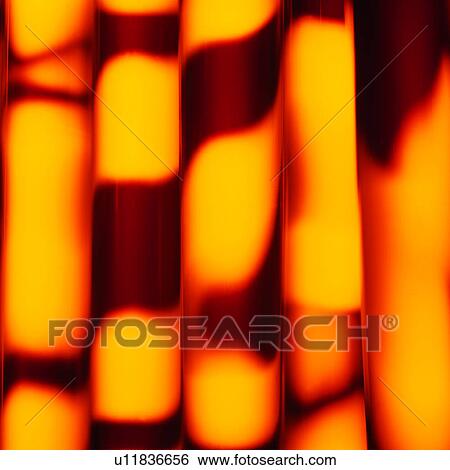 Stock Photograph - beams, abstract, light, creative, red, warm color. Fotosearch