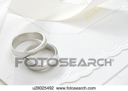 Stock Image - Pair of wedding rings. Fotosearch