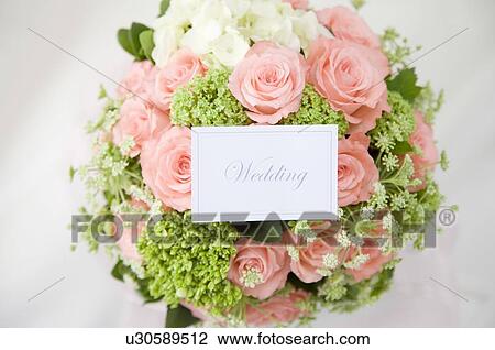 Wedding bouquet with wedding name tag View Large Photo Image Stock Image - Wedding bouquet with wedding name tag. Fotosearch
