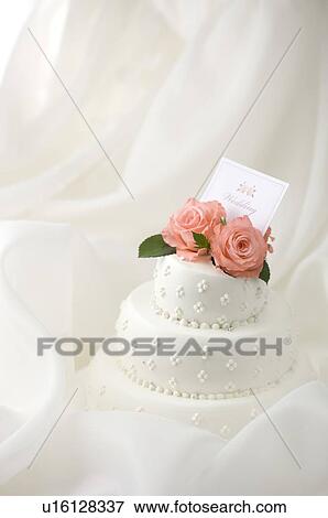 Wedding card on wedding cake View Large Photo Image Stock Photo - Wedding card on wedding cake. Fotosearch