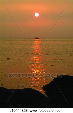 Stock Photo - Sunrise, Ocean, Water, Oceans, Scenery, Recreation, Discovery of Nature. Fotosearch