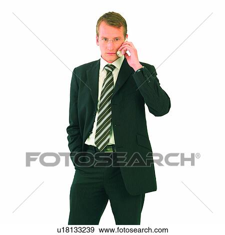 Stock Photo - Expressions, Salaried Employee, Mobile Phone, Occidental, Men, Smile, Businessmen. Fotosearch