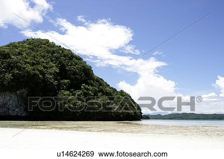 Stock Photo - blue sky, comfortable, mountain range, beach, outside, sky. Fotosearch