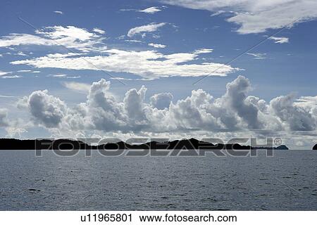 Stock Image - cloud, clear day, sky, Ocean, ocean. Fotosearch