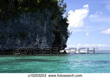 Stock Image - mountain range, sky, sky, cloud, ocean, trees. Fotosearch