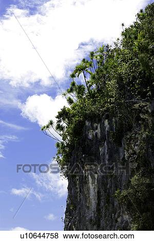 Stock Photo - quiet, blue sky, cloud, outside, clear day, daytime. Fotosearch