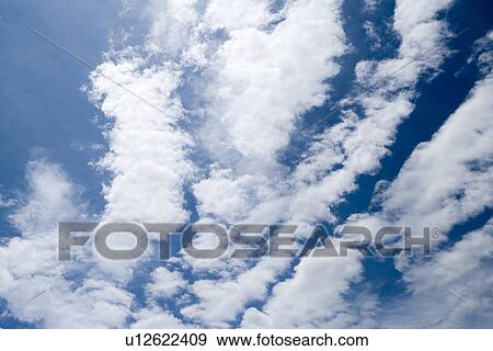 Stock Photo - seashore, outdoors, clear day, sunny day, blue sky. Fotosearch