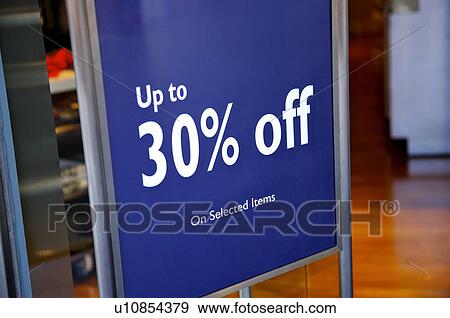 Stock Photo - Blue and white discount sign in a store. Fotosearch