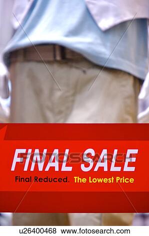 Stock Photo - Red 'Final Sale' sign in front of a male mannequin. Fotosearch