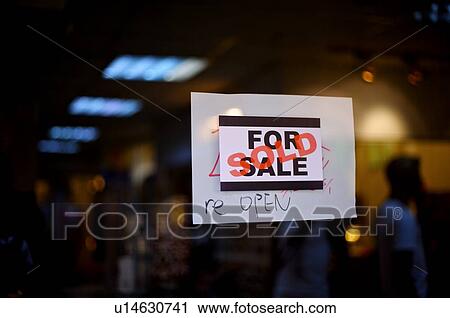 Sold' sign on a window of a store View Large Photo Image Stock Image - Sold' sign on a window of a store. Fotosearch