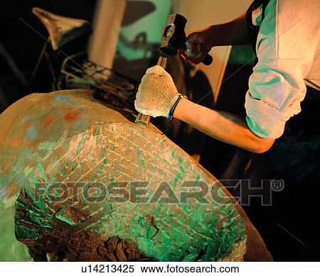 Stock Photography - Bike, Stone, Stonework, People, Carving, Creation of Art, Hammer. Fotosearch