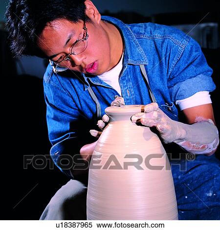Stock Photography - People, Unglazed, Ceramic Art, Yellow, Art, Men, Creation of Art. Fotosearch