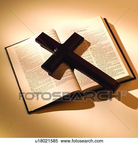 Stock Photography - Christianism, Culture, Belief, Cross, Book, Bible, Books. Fotosearch
