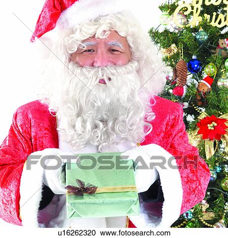 Stock Image - Festive, Christmas Day, Tradition, Toys, Festival, finalising, Amusement. Fotosearch