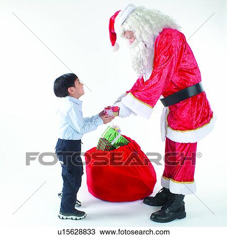 Gift, finalising, Christmas Day, Amusement, Child, Tradition, Culture View Large Photo Image Stock Image - Gift, finalising, Christmas Day, Amusement, Child, Tradition, Culture. Fotosearch
