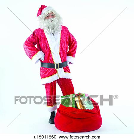 Stock Image - Gift, People, Happy, Christmas Day, Gifts, Festive, finalising. Fotosearch