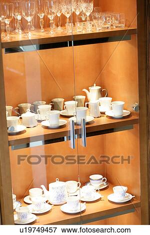 Cupboard, Containers, Goblet, Cupboards, Glass cups, Cup View Large Photo Image Stock Photo - Cupboard, Containers, Goblet, Cupboards, Glass cups, Cup. Fotosearch