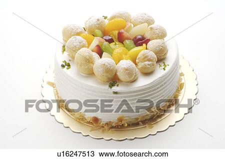 Birthday cake with fruit and mini cream puffs on top View Large Photo Image Stock Image - Birthday cake with fruit and mini cream puffs on top. Fotosearch