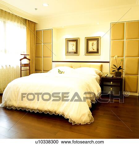Stock Image - Bed, Window, Bedrooms, Pot plants, Hanger, Windows. Fotosearch