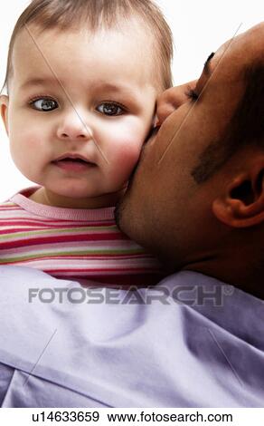 African American father holding daughter View Large Photo Image Stock Photo - African American father holding daughter. Fotosearch