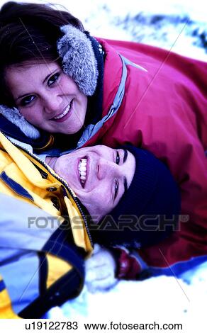 Couple in snow View Large Photo Image Stock Image - Couple in snow. Fotosearch