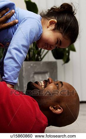 Stock Image - Father and daughter. Fotosearch