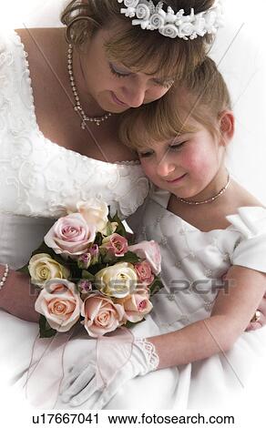 Flower girl and bride View Large Photo Image Stock Image - Flower girl and bride. Fotosearch