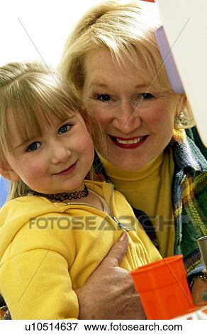 Grandma and granddaughter playing View Large Photo Image Stock Photo - Grandma and granddaughter playing. Fotosearch