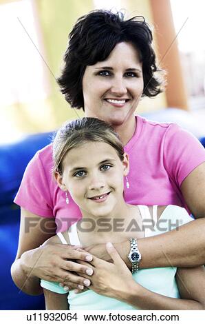 Mother and daughter at carnival View Large Photo Image Picture - Mother and daughter at carnival. Fotosearch
