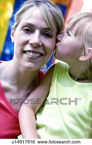 Mother and daughter at carnival View Large Photo Image Stock Photo - Mother and daughter at carnival. Fotosearch