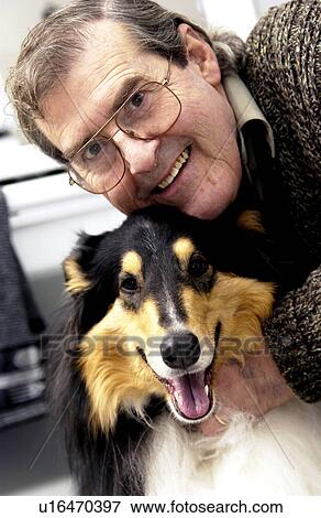Stock Photo - Senior man with his dog. Fotosearch