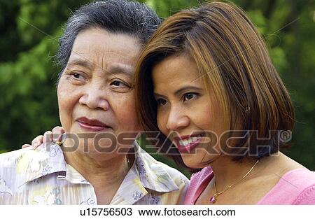 Stock Image - Two Asian women. Fotosearch