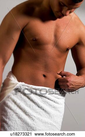 Stock Image - Man in towel. Fotosearch