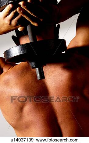 Man with barbell View Large Photo Image Stock Photo - Man with barbell. Fotosearch