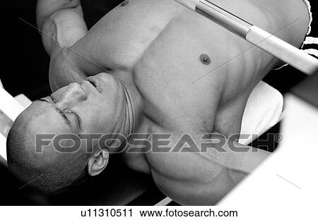 Stock Image - Man working out. Fotosearch
