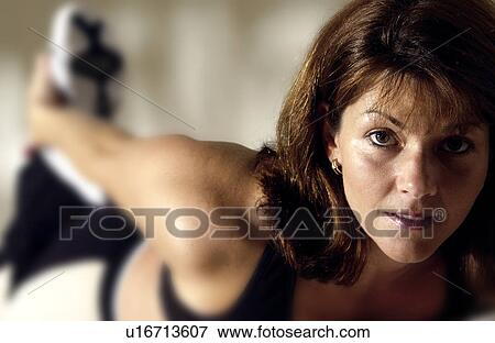 Stock Photo - Woman stretching. Fotosearch