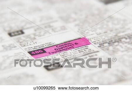 Stock Photography - Real estate ad in classified section of newspaper. Fotosearch