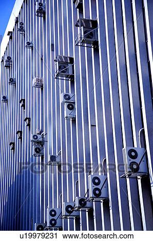 Air-conditioners on a building exterior View Large Photo Image Stock Image - Air-conditioners on a building exterior. Fotosearch