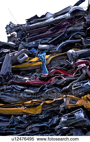 Compressed cars stacked together in a junkyard View Large Photo Image Stock Photography - Compressed cars stacked together in a junkyard. Fotosearch