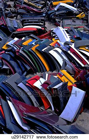 Rows and piles of run-down car parts View Large Photo Image Stock Photo - Rows and piles of run-down car parts. Fotosearch