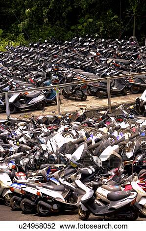 Rows of run-down motorcycles, outdoors View Large Photo Image Stock Image - Rows of run-down motorcycles, outdoors. Fotosearch