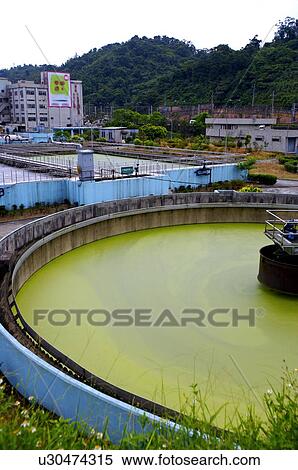 Sewage treatment plant, outdoors View Large Photo Image Stock Photography - Sewage treatment plant, outdoors. Fotosearch