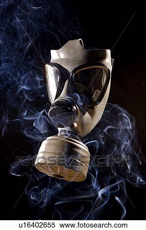 Smoke surrounding a gas mask View Large Photo Image Stock Photography - Smoke surrounding a gas mask. Fotosearch