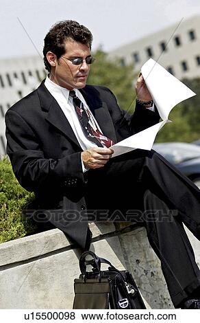 Businessman working outside View Large Photo Image Stock Photo - Businessman working outside. Fotosearch