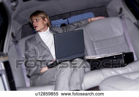 Businesswoman in limousine View Large Photo Image Stock Photography - Businesswoman in limousine. Fotosearch