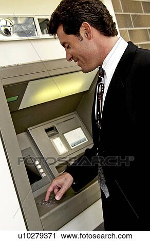 Man at ATM View Large Photo Image Stock Image - Man at ATM. Fotosearch