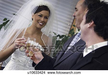 Bride and Groom at reception View Large Photo Image Picture - Bride and Groom at reception. Fotosearch