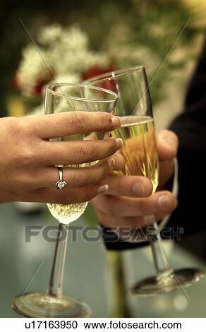 Bride and groom toasting View Large Photo Image Stock Image - Bride and groom toasting. Fotosearch
