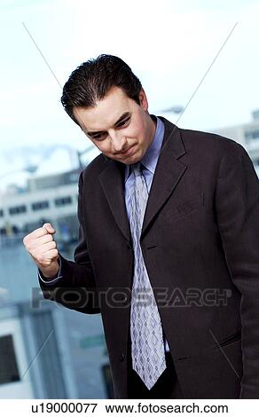 Stock Photo - Excited businessman . Fotosearch