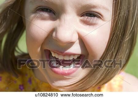 Stock Image - Girl - 6 years old in the park in the fall, Winnipeg, Canada. Fotosearch